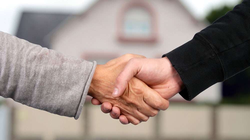 Your Offer to Buy a Home Was Accepted: What's Next? Handshake after buying a home