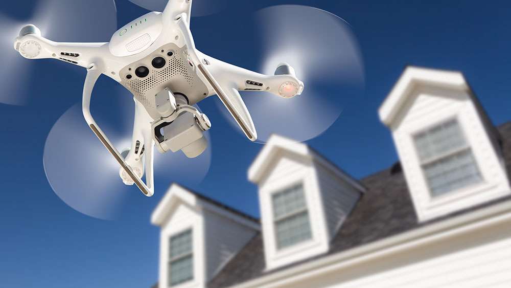 Should You Add Drone Photos and Video to Your Real Estate Listing? Drone taking pictures of a home for a real estate listing