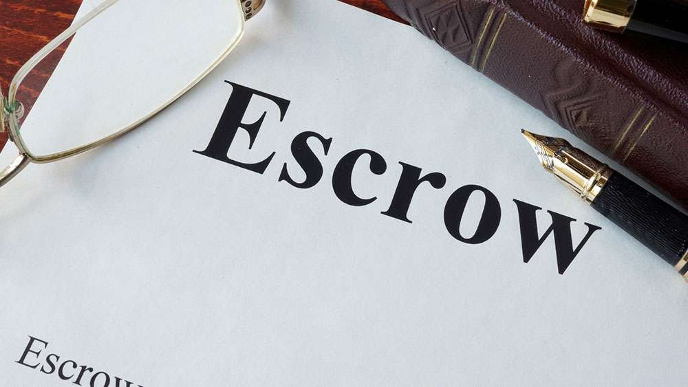 Escrow papers on desk